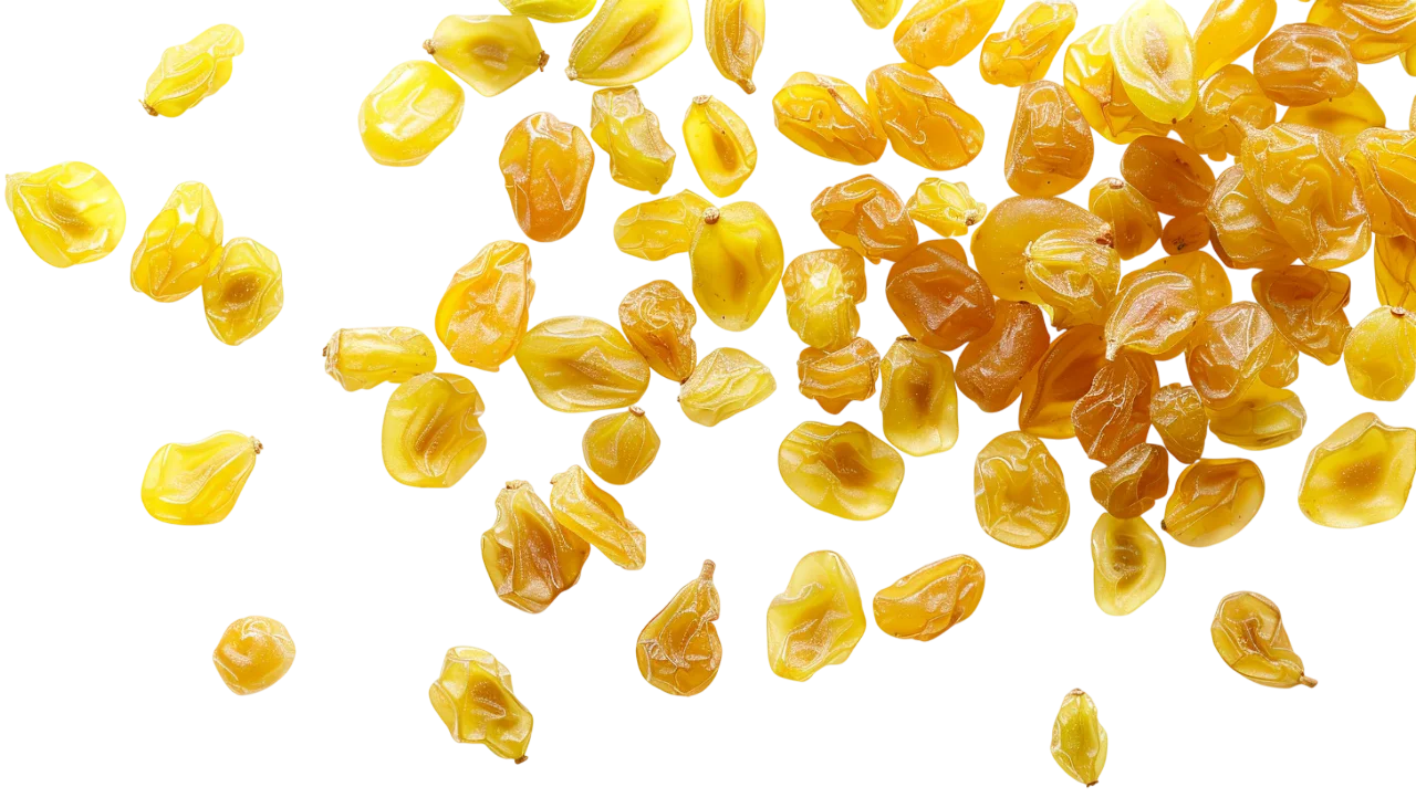 Scattered Golden Dried Fruit Pieces Free PNG