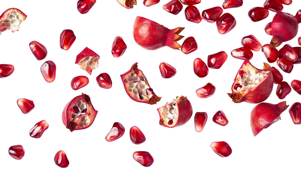 Scattered Pomegranate Seeds and Fruit Pieces Free PNG