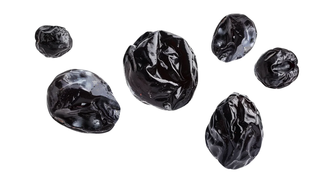 Glossy Black Prunes on a Dark Background Free PNG