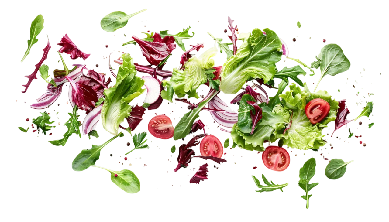 Free PNG of Floating Mixed Salad Greens and Tomato